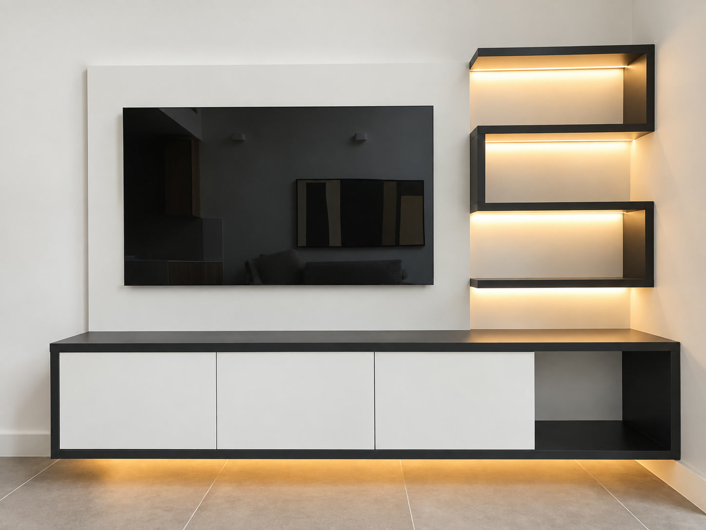 Bespoke white TV media wall in a London living room with floating handleless cabinet and warm LED display shelves