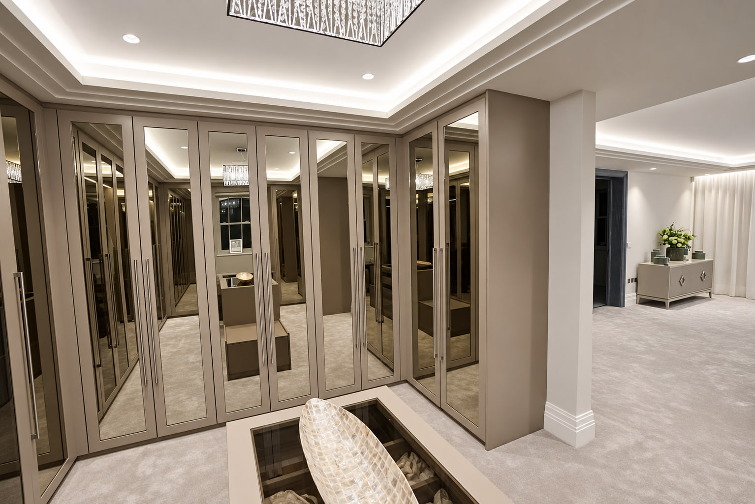Corner layout in a taupe mirrored dressing room